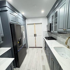 We-Transformed-a-tiny-Galley-Kitchen-in-Astoria-Queens-using-Barn-doors-to-create-more-of-an-open-concept 9